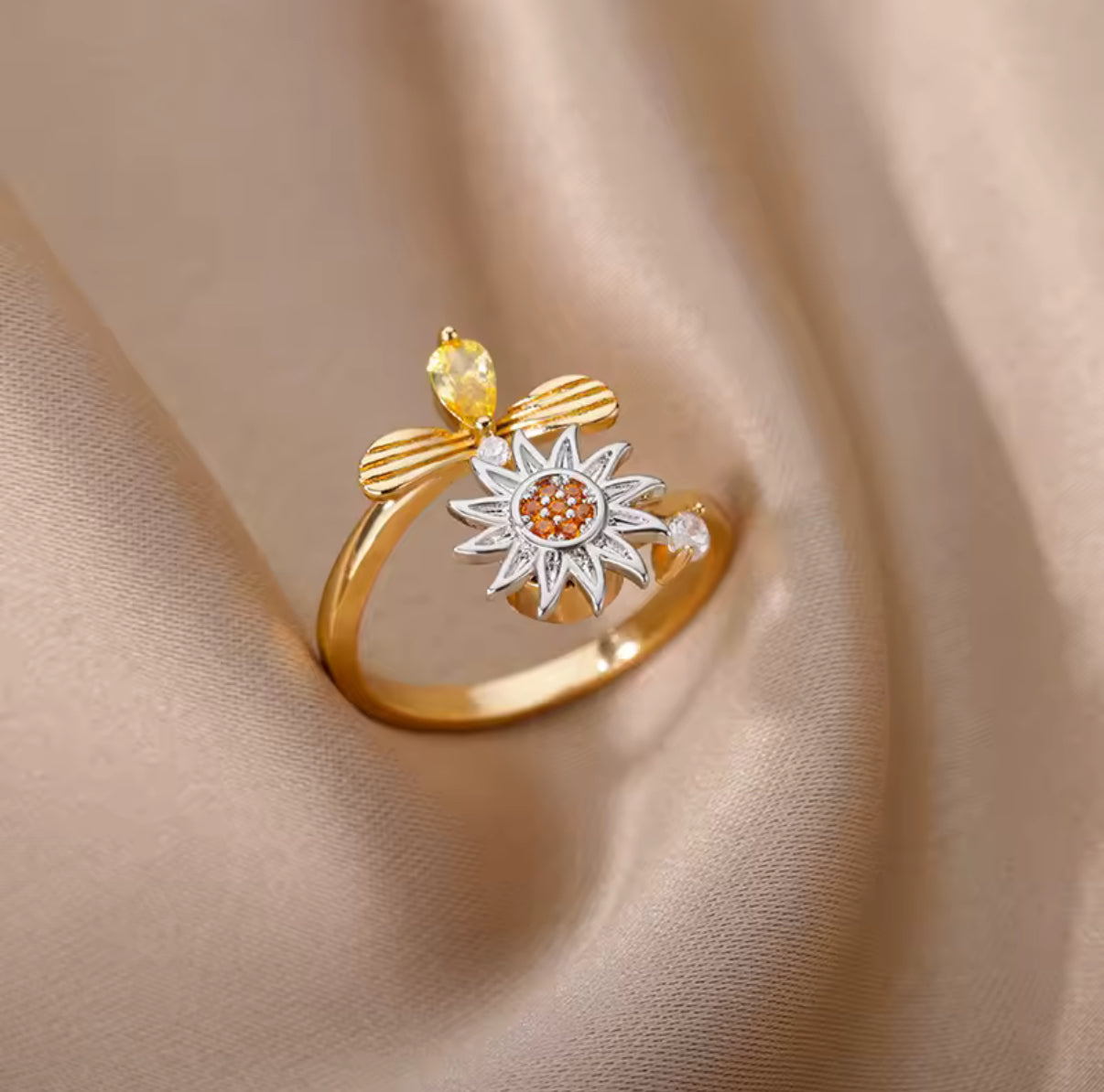 Rotating ring sun &amp; bee
